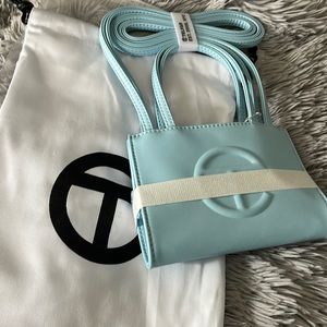 Small pool blue telfar bag